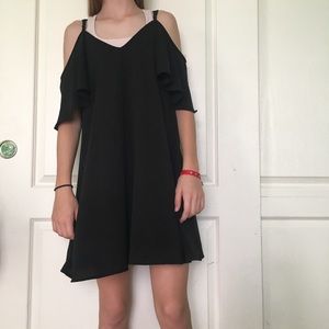 Black cold shoulder dress.